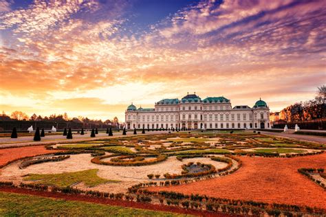 Belvedere, Vienna, view of Upper Palace and beautiful royal garden in sunrise light, colorful ...