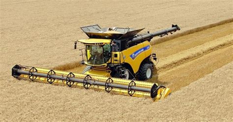 COMBINE HARVESTER INVENTION DEVELOPMENT FARMING