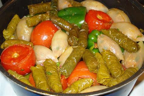 Dolma't Renjeh (Stuffed Vegetables) Onions, tomatoes, peppers, eggplant ...