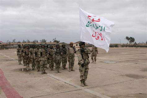 Iraqi Army Soldiers of the 2nd Brigade, 1ST Iraqi Army Division stand ...