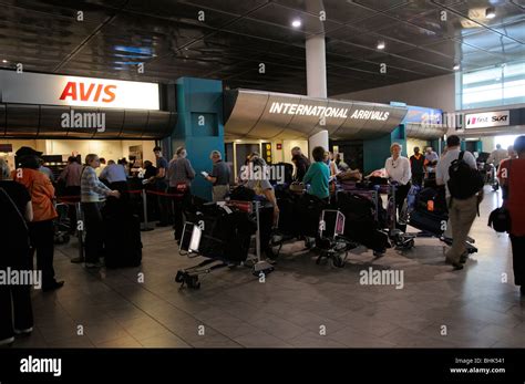 International passengers arriving at Cape Town airport arrivals hall ...