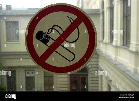 smoking ban or smoking prohibited sign with pictogram of a filter ...