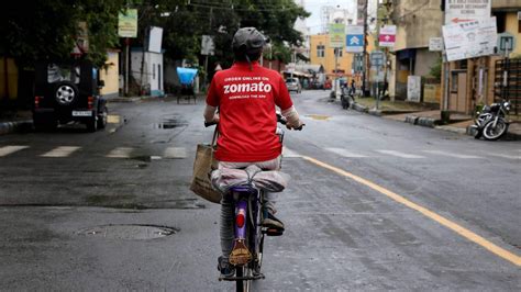 Zomato delivery partner carries both children to work; ’inspiring’ say ...