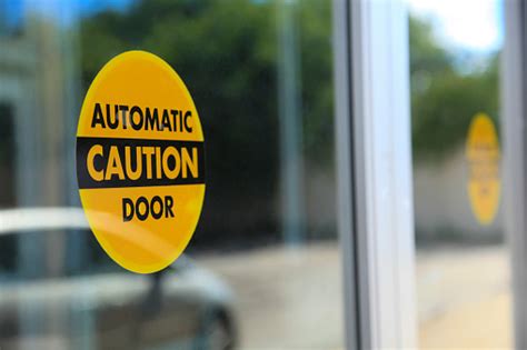 Automatic Door Caution Sign Stock Photo - Download Image Now - iStock