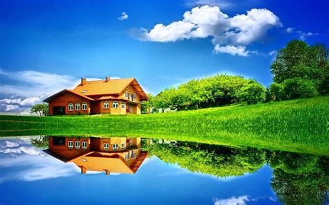 a house is reflected in the water on a sunny day