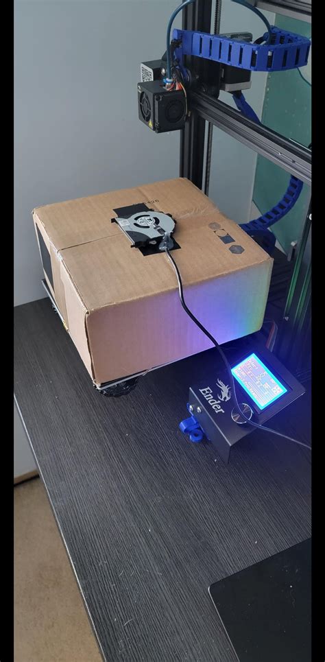 Made a DIY filament dryer that uses the hotbed from a cardboard box ...