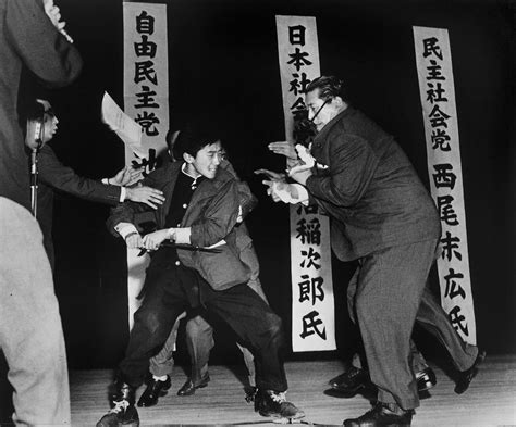 Using a traditional blade, 17-year-old Yamaguchi assassinates politician Asanuma in Tokyo, 1960 ...