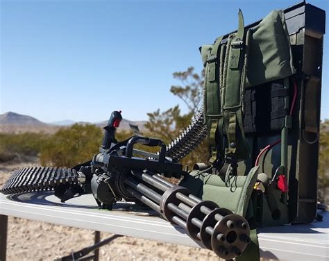 File:Minigun with ammo backpack.jpg - Internet Movie Firearms Database - Guns in Movies, TV and ...