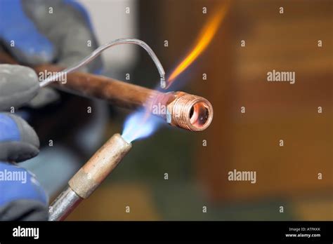 Soldering Copper Pipe High Resolution Stock Photography and Images - Alamy