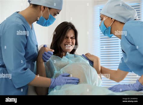 Woman giving birth in hospital hi-res stock photography and images - Alamy