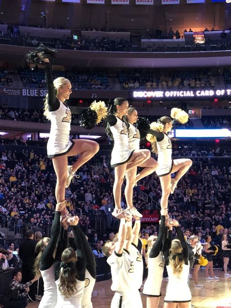 Purdue | Cool cheer stunts, Cheerleading stunt, Cheer stunts