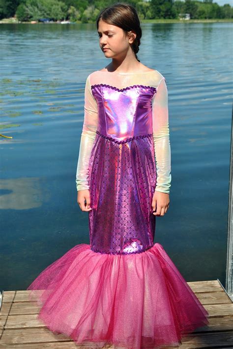 This is a beautiful mermaid costume with an iridescent bodice with a ...