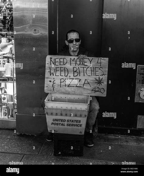 Street panhandler, Times Square NYC Stock Photo - Alamy
