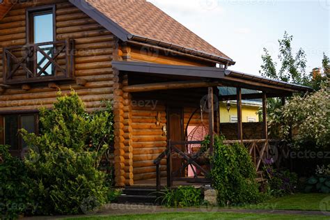 Modern Log Cabin Home in a Forest Environment 17660135 Stock Photo at Vecteezy