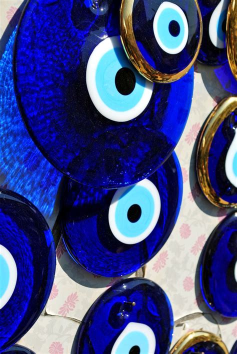 Mavi Boncuk charms in a Turkish market | Eyes wallpaper, Evil eye art ...