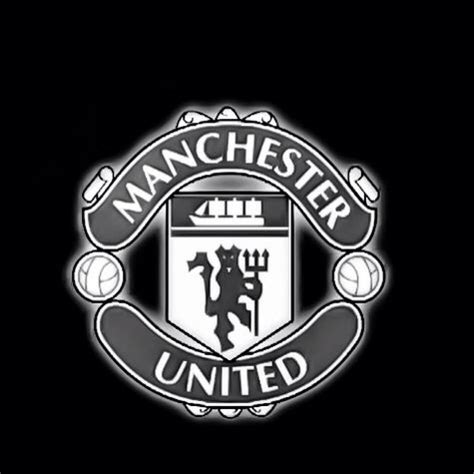 MUFC badge/logo. Silvered