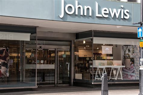 john lewis store front on the corner of a city street