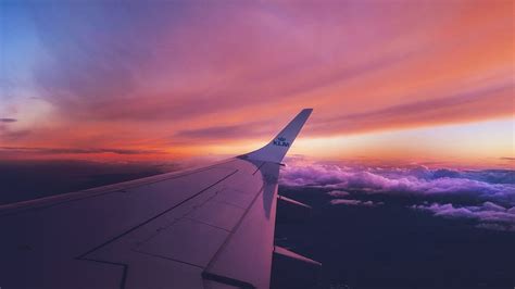 HD wallpaper: white airplane wing with white clouds, close-up photograph of right wing of ...