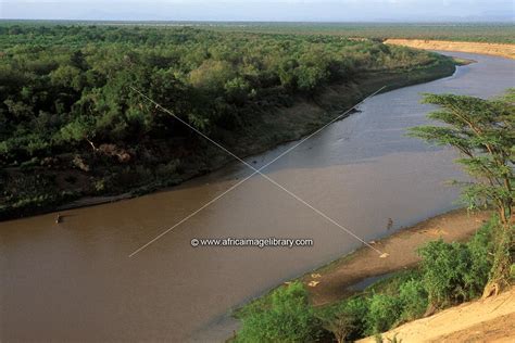 Photos and pictures of: view of the Omo river with boats crossing, Omo Valley, Kolcho village ...