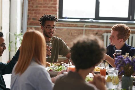 Group of Person Eating Indoors · Free Stock Photo