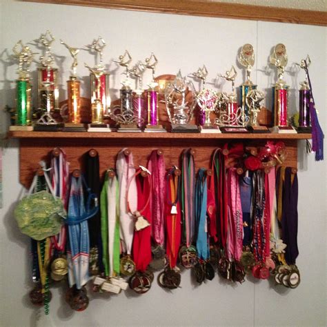 Some of my medals and trophies but I still have lots more!! | Award display, Trophies and medals ...