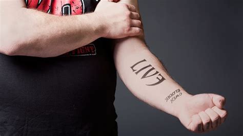 Kevin Owens' Tattoos - What Do They Mean? | PWPIX.net