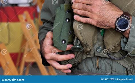 Close-up of the Hands of a Military Pilot Wearing Flight Suit Life Buoy Editorial Photography ...