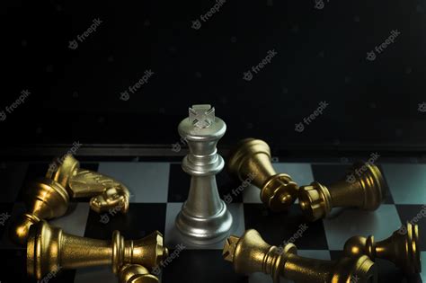 Premium Photo | Gold and silver chess on board