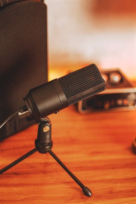 Microphone Podcast on Wooden Top Table · Free Stock Photo