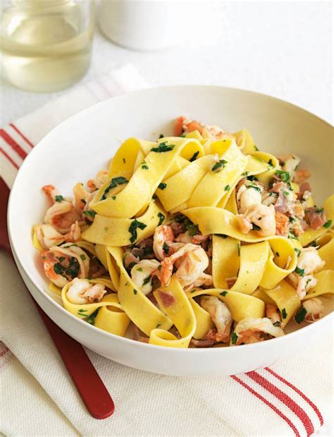 Tagliatelle with prawns, Parma ham and parsley | Sainsbury's Magazine