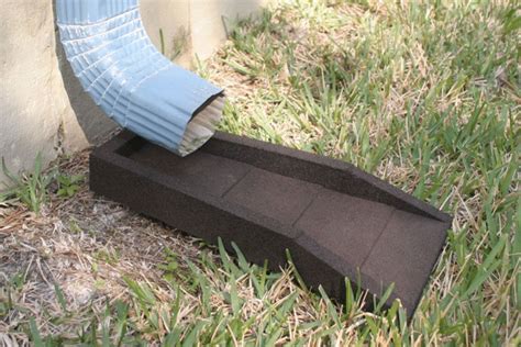 Rubber Designs Downspout Splash Block helps with water erosion and gutter run-off away from your ...