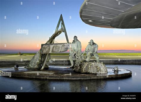 Fishermen sculpture National Aquarium Napier New Zealand Stock Photo - Alamy