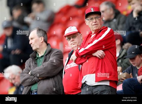 Rotherham United fans in the stands Stock Photo - Alamy