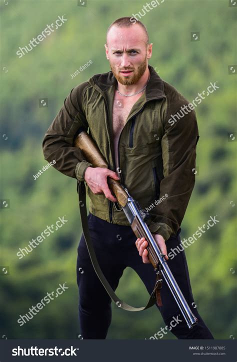 19,907 Man Holding A Rifle Images, Stock Photos & Vectors | Shutterstock