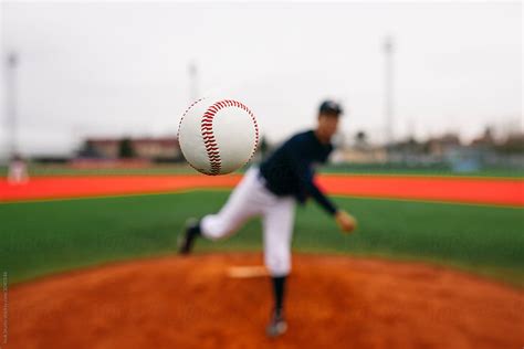 «Baseball Ball Flying After Throw» del colaborador de Stocksy «Inuk ...