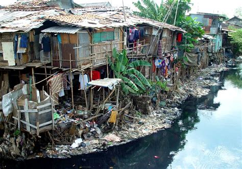 Many slums in Jakarta are next to or close to water, causing many ...