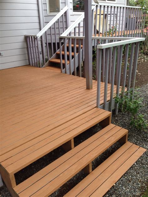 Stain Your Deck with Olympic Max Stain in Cedar