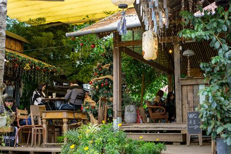 Cafe inside an old Wooden Train Waggon at the Dalat Railway Station in Da Lat, Vietnam ...