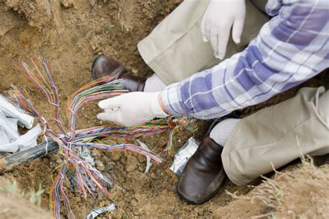 Telephone Cable Repair. A technician repairs an underground telephone line , #SPONSORED, #Repair ...