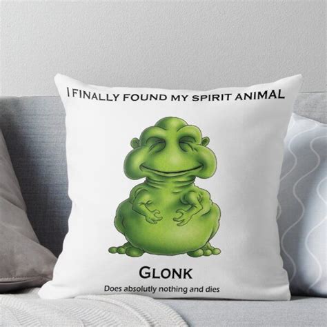 a green cartoon character sitting on top of a couch with the caption glokk does absolutely ...