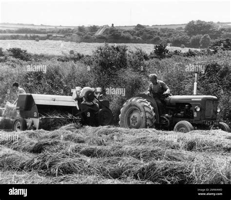 Making hay bales Black and White Stock Photos & Images - Alamy