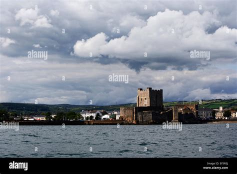 storm clouds over carrickfergus castle and harbour county antrim ...