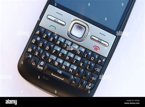 Smartphone with azerty keyboard on white background Stock Photo - Alamy