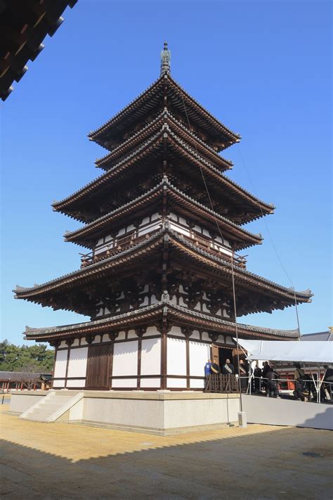 A national-treasure pagoda at Yakushiji, a Buddhist temple listed as a World Heritage site ...