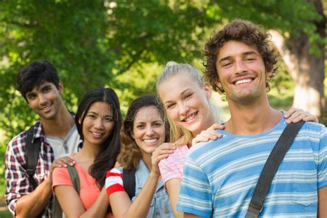 College Friends Gesturing Thumbs Up in Campus Stock Image - Image of people, campus: 37822561