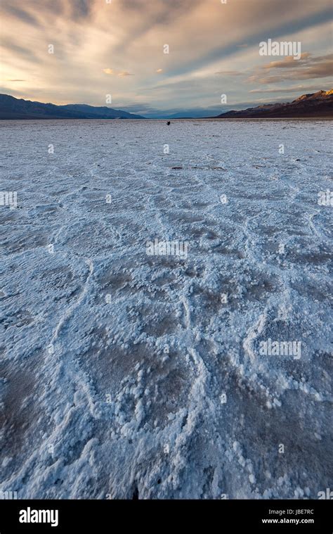 The iconic landscape of Badwater Basin, lowest elevation in the western hemisphere, during ...