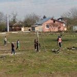 Kids playing soccer in Branesti, Romania - Virtual Globetrotting