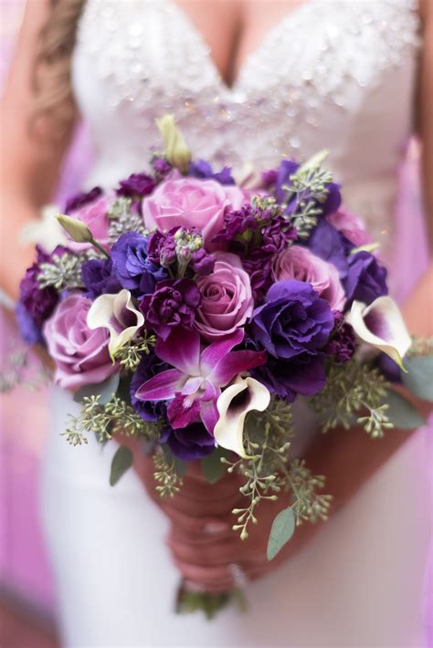 Shades of purple bridal bouquet: lavender roses, purple lisianthus & dendrobiums… | Bridal ...