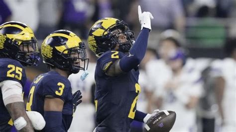 Defense leads Michigan past Washington for 10th national title ...