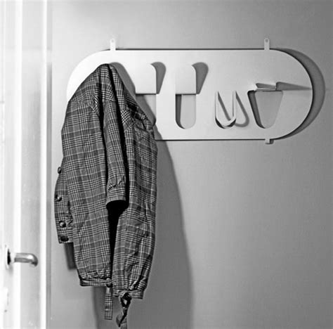 Not Just for Hanging Coats - Yanko Design | Metal coat hangers, Coat rack wall, Umbrella